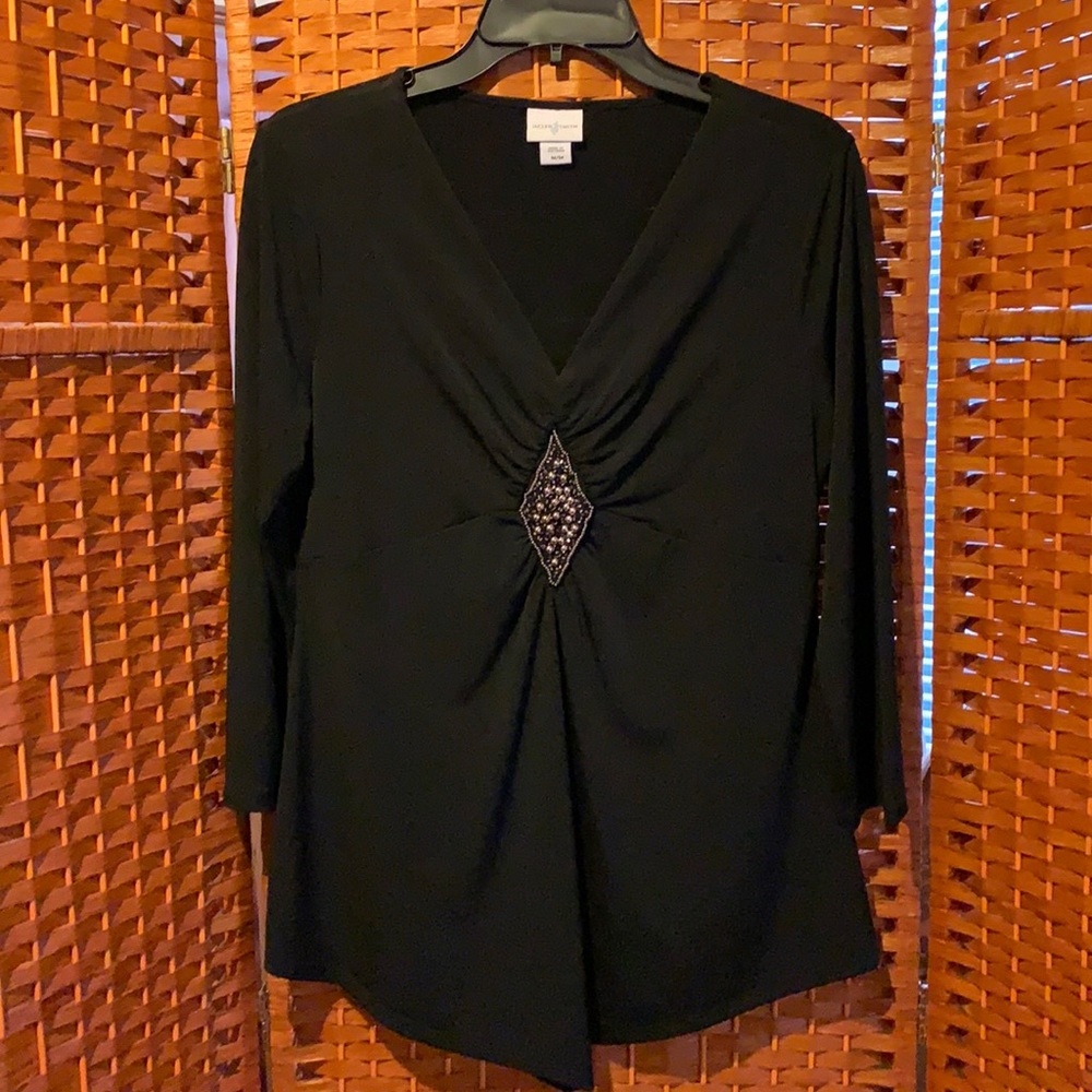 Jaclyn Smith black top